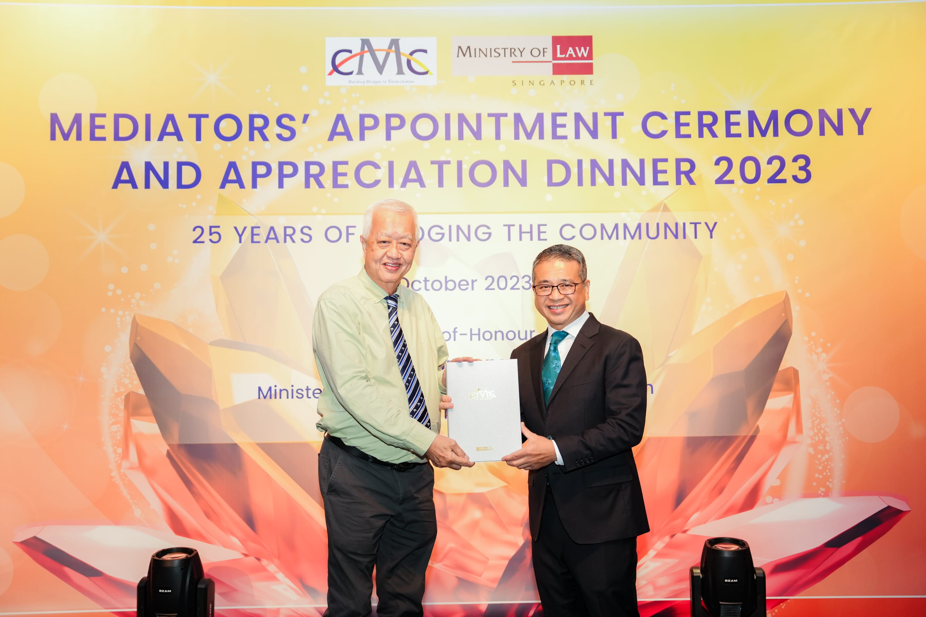 reappointment Image 2 award with Min Edwin